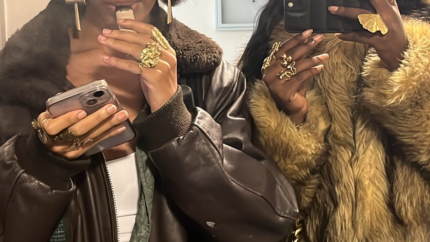 Two women with some rings at their fingers