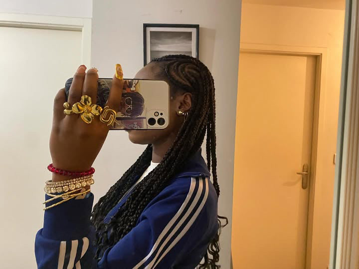 a woman with some rings at her hand